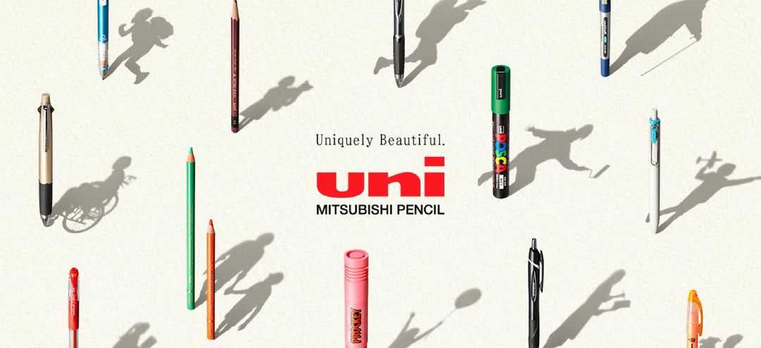 Japanese stationery arrangement of Uni gel pens, mechanical pencils, and a Posca marker by Mitsubishi Pencil, featuring the logo.