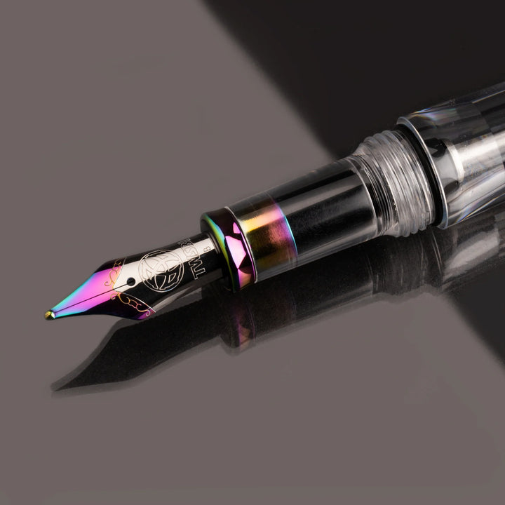 Close-up of TWSBI VAC700R Fountain Pen – Iris's nib on a dark background