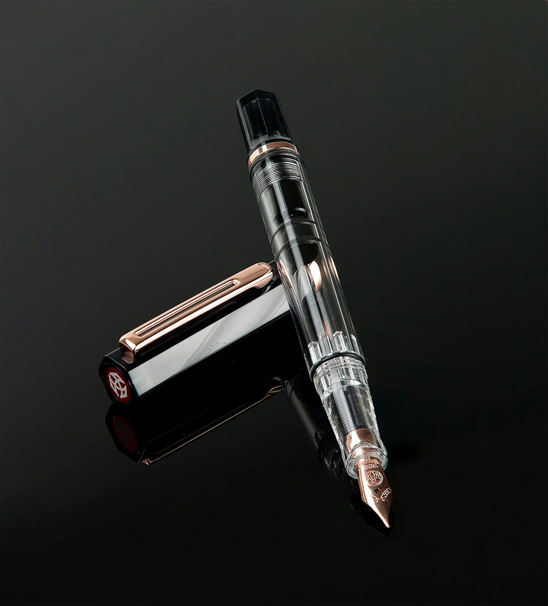 TWSBI ECO Fountain Pen – Smoke Rose Gold on a black background