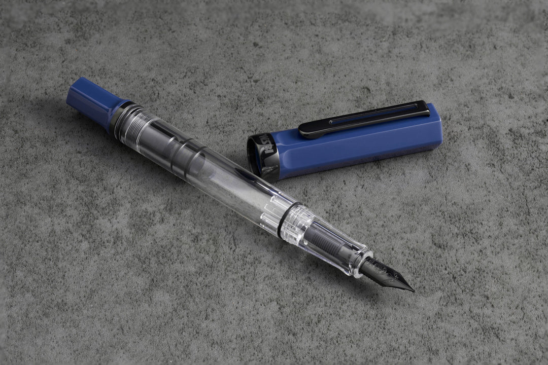 TWSBI ECO Fountain Pen – Slate Blue Onyx on a gray concrete surface