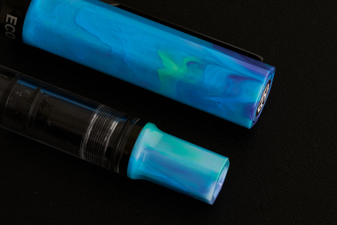 close up on TWSBI ECO Fountain Pen – Cosmo Onyx on a black background