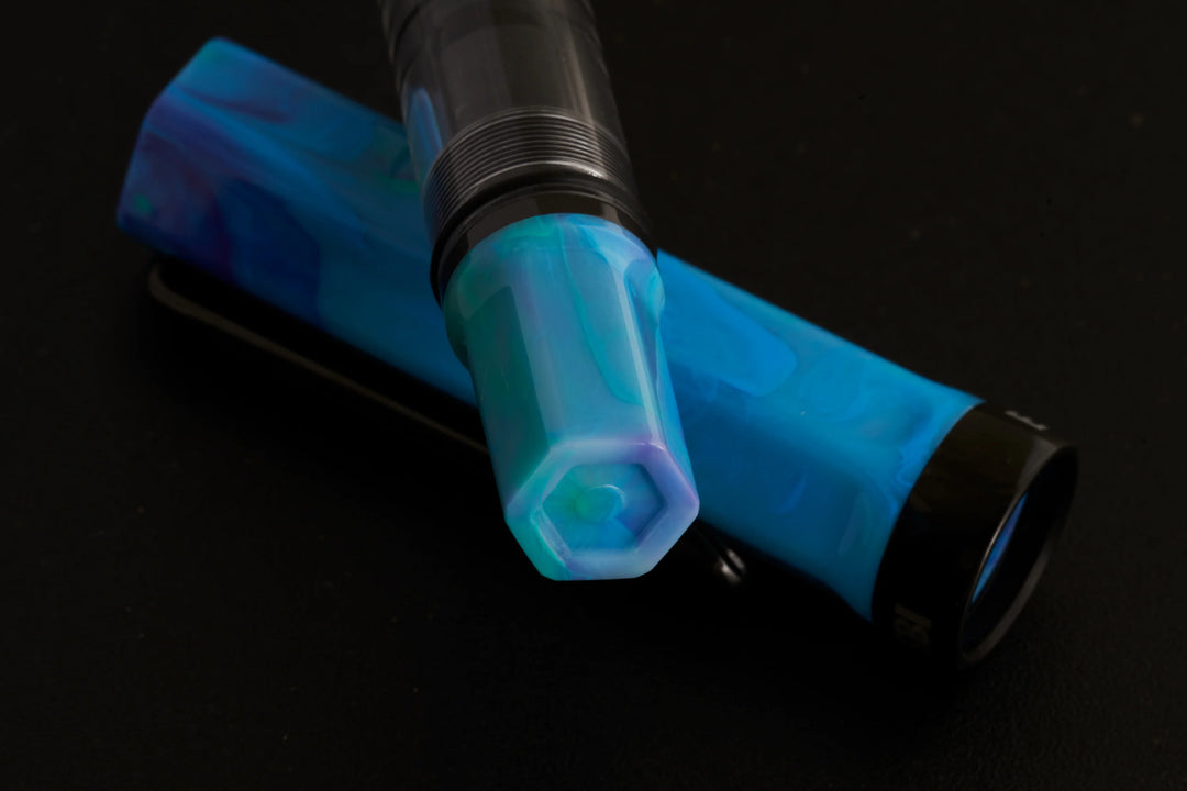 close up on TWSBI ECO Fountain Pen – Cosmo Onyx on a black background