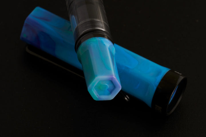 close up on TWSBI ECO Fountain Pen – Cosmo Onyx on a black background