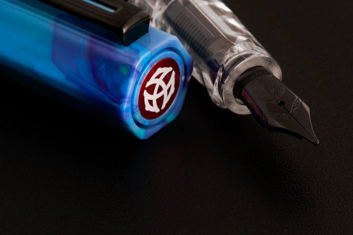 close up on TWSBI ECO Fountain Pen – Cosmo Onyx, black nib, on a black background