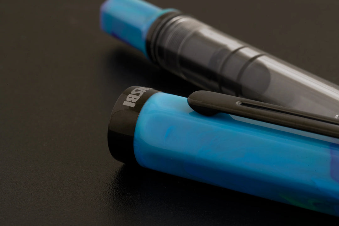 close up on TWSBI ECO Fountain Pen – Cosmo Onyx on a black background