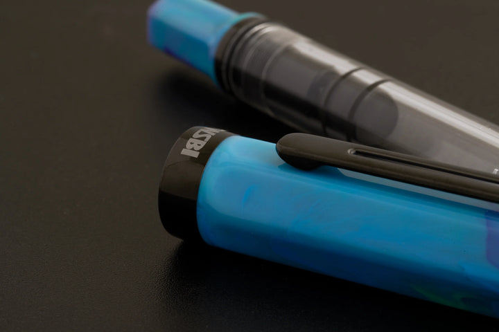 close up on TWSBI ECO Fountain Pen – Cosmo Onyx on a black background