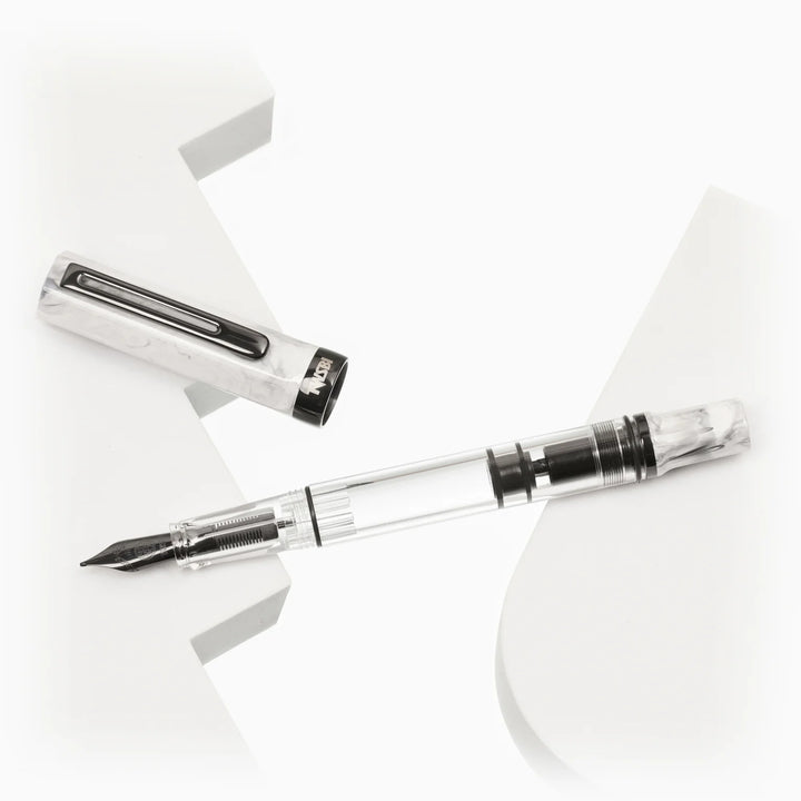 TWSBI ECO Fountain Pen – Carrara Onyx on a white surface