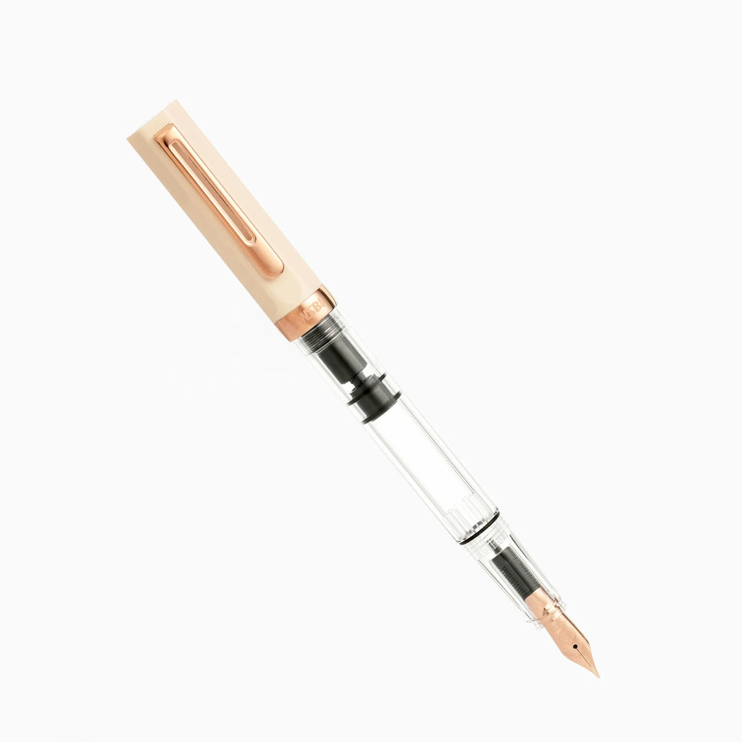 TWSBI ECO Fountain Pen – Creme Rose Gold with transparent body on a white background