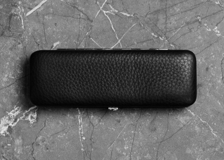 Top-down view of the F. Hammann 3883 Black Chervo leather case, designed to be a flat, pocket-friendly protector for high-end writing tools.