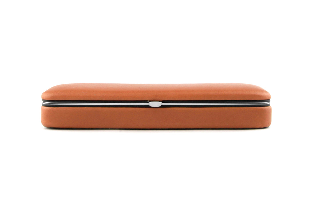 Front profile of the closed F. Hammann 3883 Coxorange leather case, highlighting the ultra-slim 2cm metal-framed design and polished snap closure.