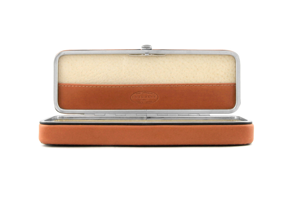 Front view of the open F. Hammann 3883 Framed Case in Coxorange Alpina, featuring the adaptive, single-piece interior bridge and integrated lid compartment.