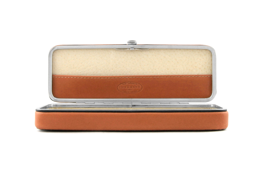 Front view of the open F. Hammann 3883 Framed Case in Coxorange Alpina, featuring the adaptive, single-piece interior bridge and integrated lid compartment.