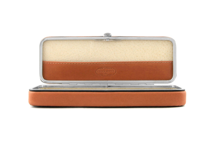 Front view of the open F. Hammann 3883 Framed Case in Coxorange Alpina, featuring the adaptive, single-piece interior bridge and integrated lid compartment.