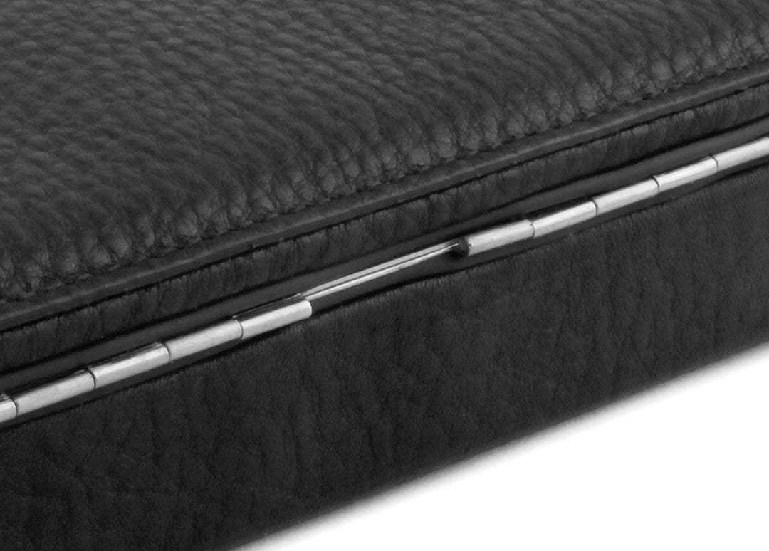 Close-up of the seamless silver piano hinge and textured black Chervo calfskin exterior of the 3976 Ruler Box.