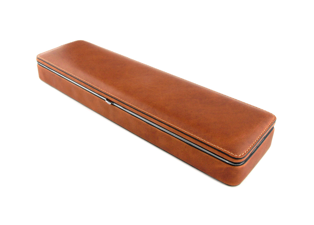 Angled perspective of the closed F. Hammann 3976 Ruler Box in smooth Coxorange leather, showcasing the silver metal frame.
