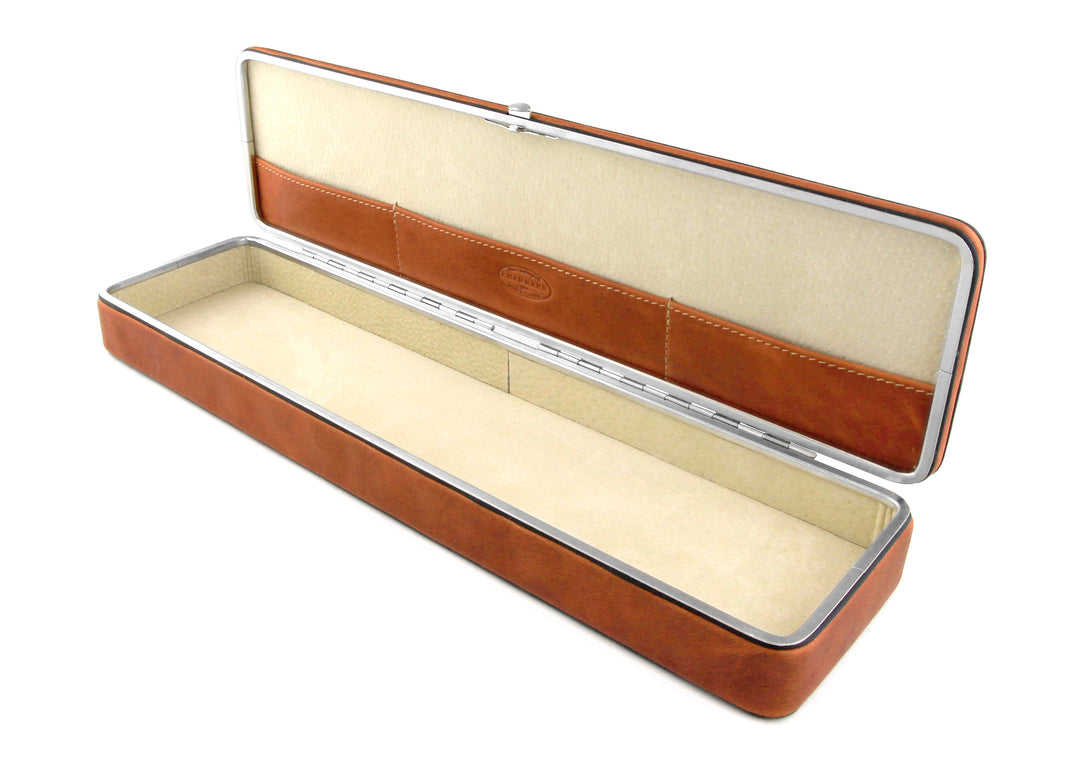 Angled perspective of the open F. Hammann 3976 Ruler Box, revealing its deep beige suede base and embossed Coxorange lid slip.