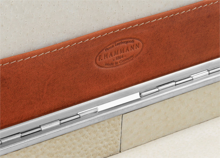 Macro view inside the 3976 Ruler Box detailing the F. Hammann 1864 embossed logo on Coxorange leather and silver hinge.
