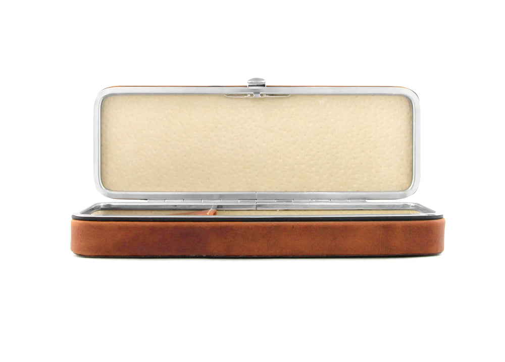 Front view of the open F. Hammann 3983 Framed 3-Pen Case in Coxorange Alpina leather, showing the protective cream lining and high-precision metal frame.