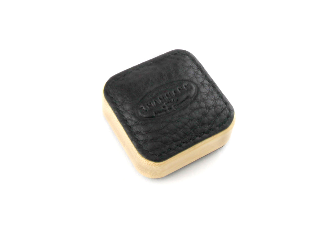 Close-up angled view of the F. Hammann 5205 Black Leather Tape Measure, detailing the embossed 1864 heritage logo.