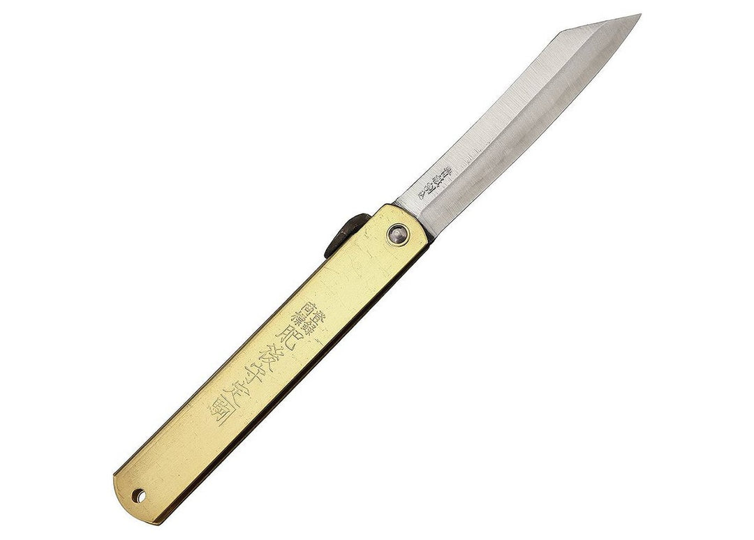 Fully open Higonokami Brass XL Japanese pocket knife showcasing the Aogami blue paper steel blade and engraved brass handle.