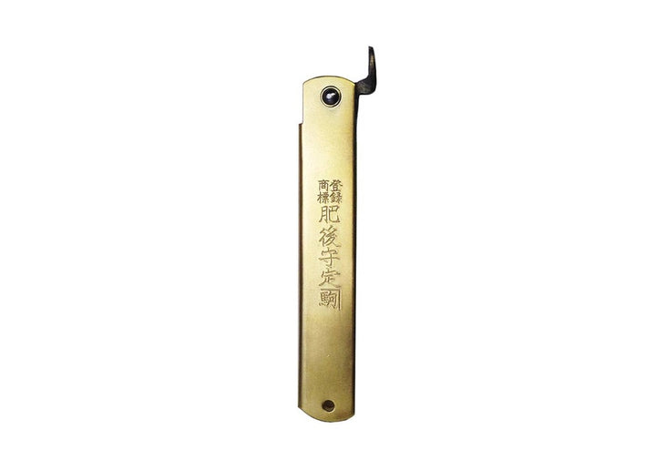 Closed profile of the Higonokami Brass XL pocket knife featuring authentic Japanese handle engravings and the extended chikiri lever.