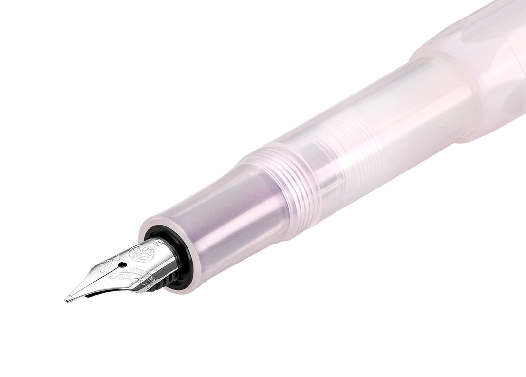 Close-up of the translucent grip section and silver 060 stainless steel nib on the Kaweco Lunar Sport Fountain Pen in Light Purple.