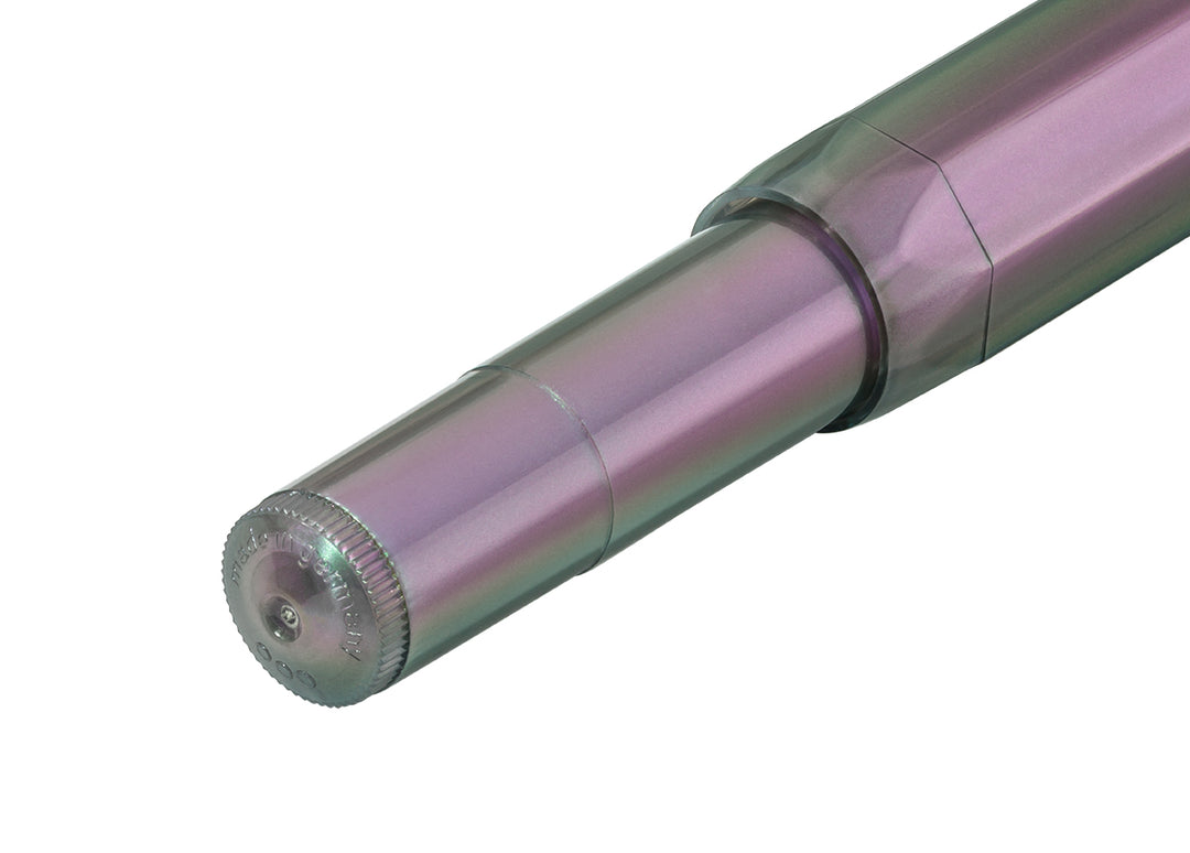 Close-up of the barrel end on the Kaweco Lunar Sport Fountain Pen in Shadow Purple, showing the ribbed edge and embossed Made in Germany text on the translucent iridescent body.