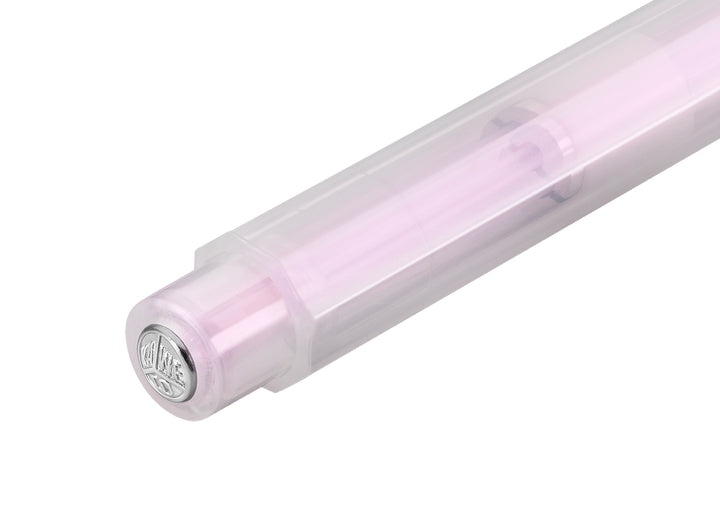 Close-up of the silver Kaweco logo push button on the Kaweco Lunar Sport Mechanical Pencil in Light Purple, highlighting the pale, semi-translucent iridescent octagonal barrel.