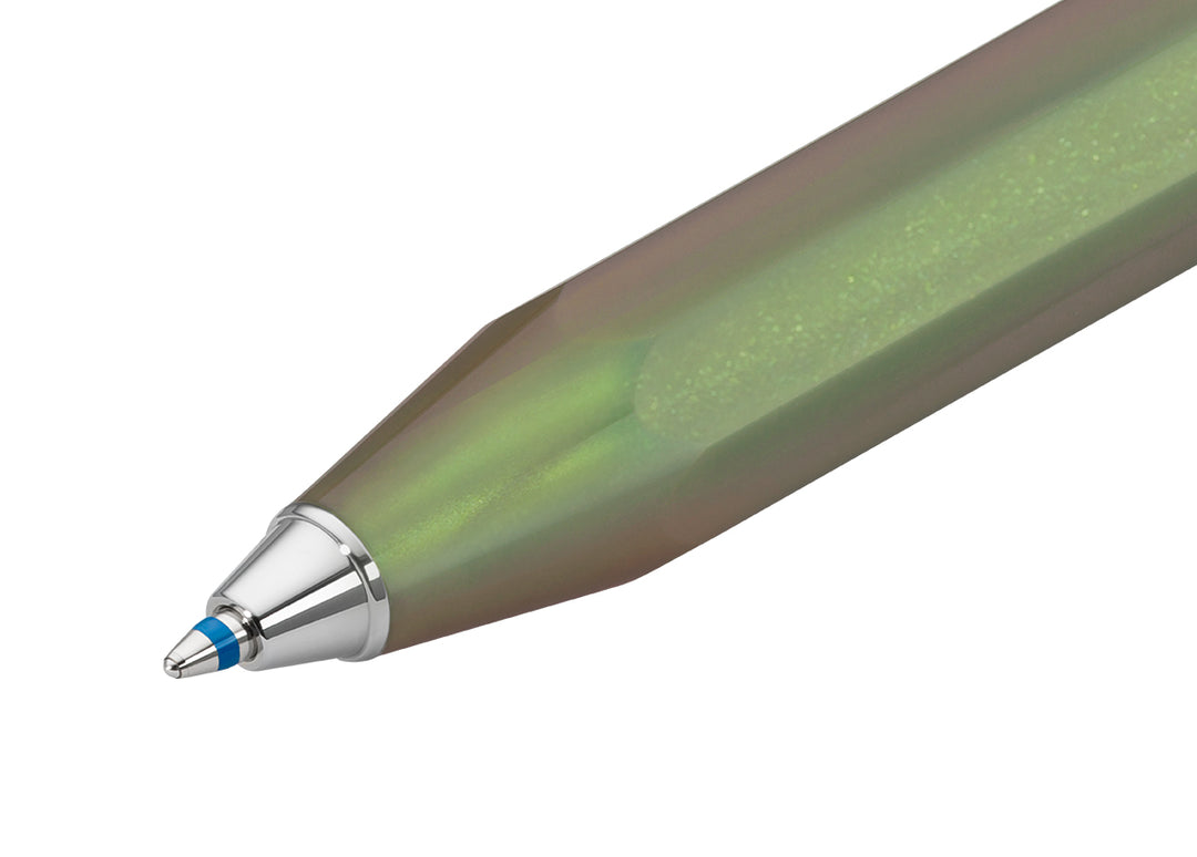 Macro shot of the silver metal cone and blue ballpoint tip extended from the Kaweco Lunar Sport Ballpoint Pen in Shadow Green.