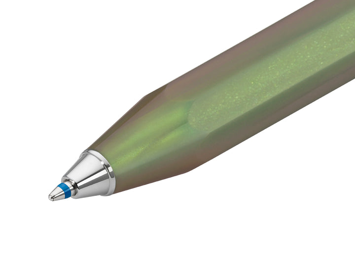 Macro shot of the silver metal cone and blue ballpoint tip extended from the Kaweco Lunar Sport Ballpoint Pen in Shadow Green.