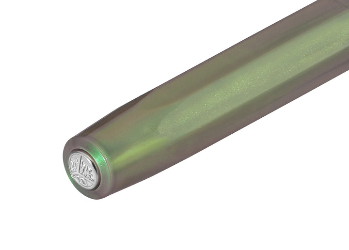 Close-up of the silver Kaweco logo medallion on the top of the Shadow Green octagonal cap.