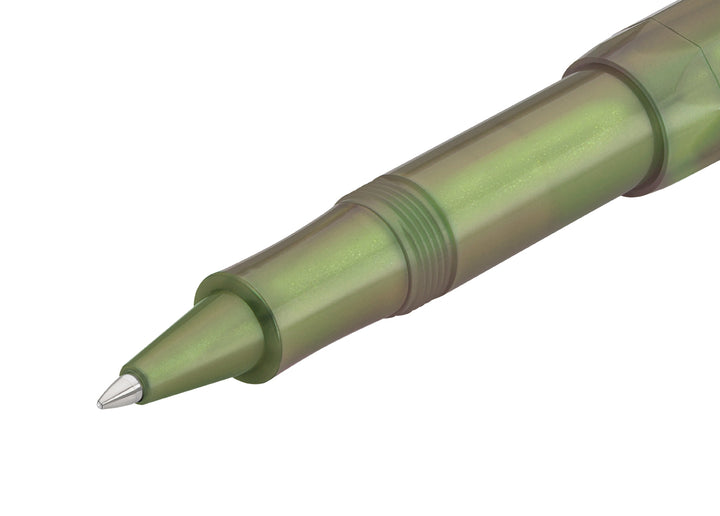 Macro shot of the ceramic rollerball tip and smooth grip section on the Kaweco Lunar Sport Shadow Green.