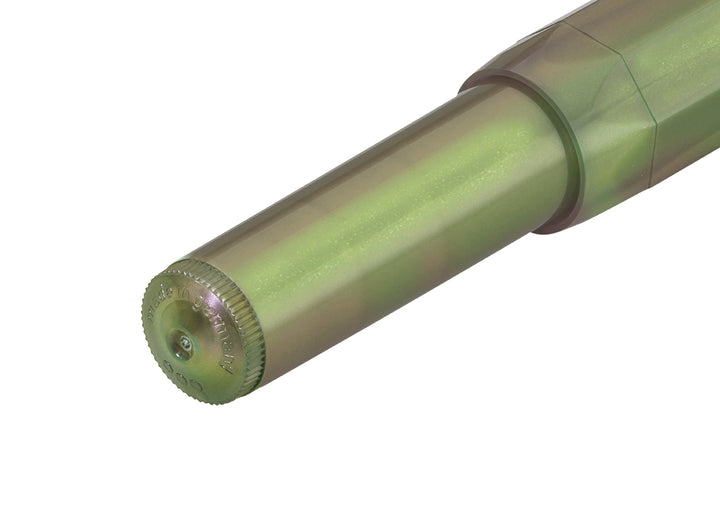 Detail view of the Kaweco Lunar Sport barrel end showing the "Made in Germany" engraving and the iridescent pearl effect on the Shadow Green finish.