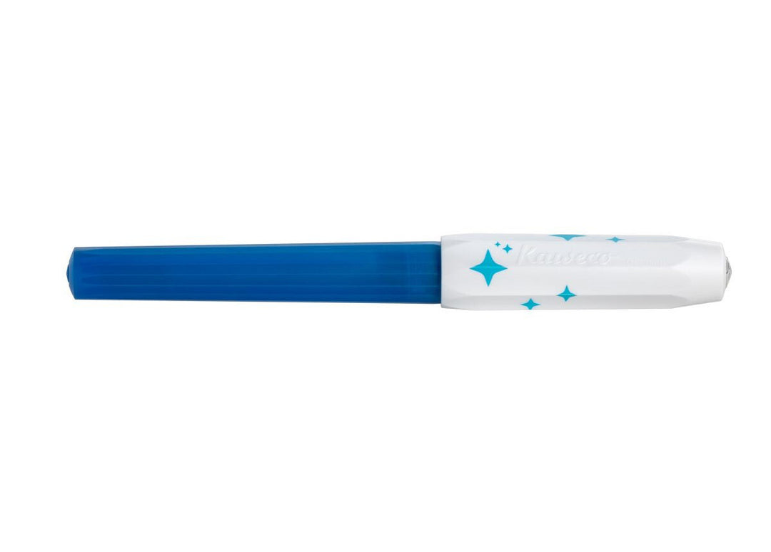 The Kaweco Perkeo Glow limited edition rollerball pen fully capped, highlighting the bold contrast between the deep blue barrel and the white octagonal cap decorated with playful blue stars.