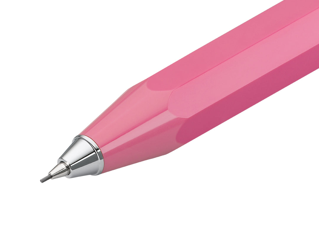 Macro shot of Kaweco Skyline Sport Pink 0.7mm tip showing precise metal sleeve guiding the HB graphite lead.