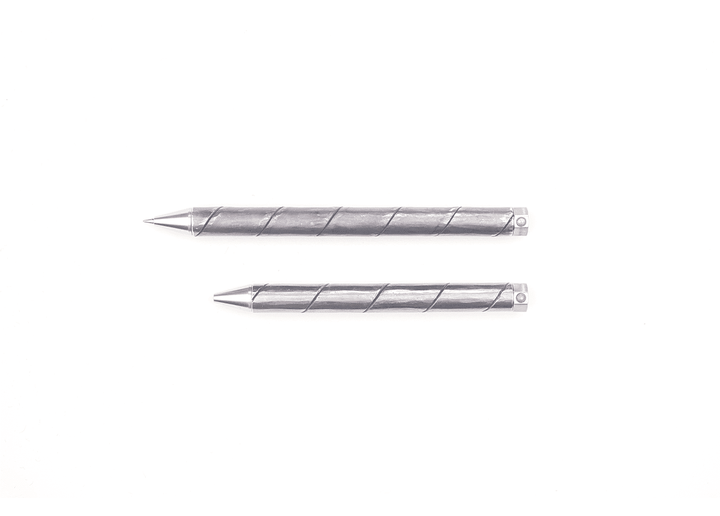 Horizontal size comparison of the longer 130mm and compact 110mm Kurogane Kazura Forged Finish ballpoint pens, showing their bare tapered writing tips.