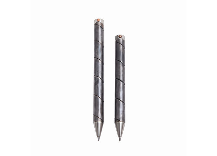 Size comparison of 110mm and 130mm Kurogane Kazura metal ballpoint pens standing vertically.