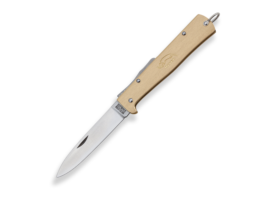 Otter Mercator Brass Pocket Knife fully open, displaying the 90mm stainless steel blade and solid brass handle with the classic Otter logo.