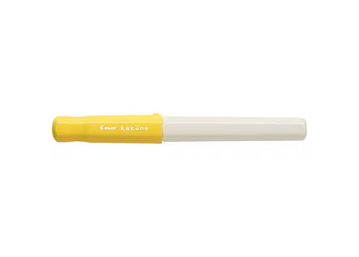 Pilot Kakuno Soft Yellow fountain pen with pastel Yellow cap and white ergonomic body.