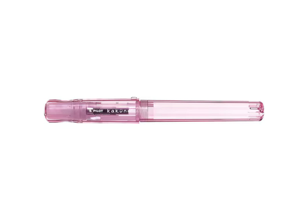 Pilot Kakuno Fountain Pen Transparent Pink edition with closed hexagonal cap and translucent pink demonstrator body.