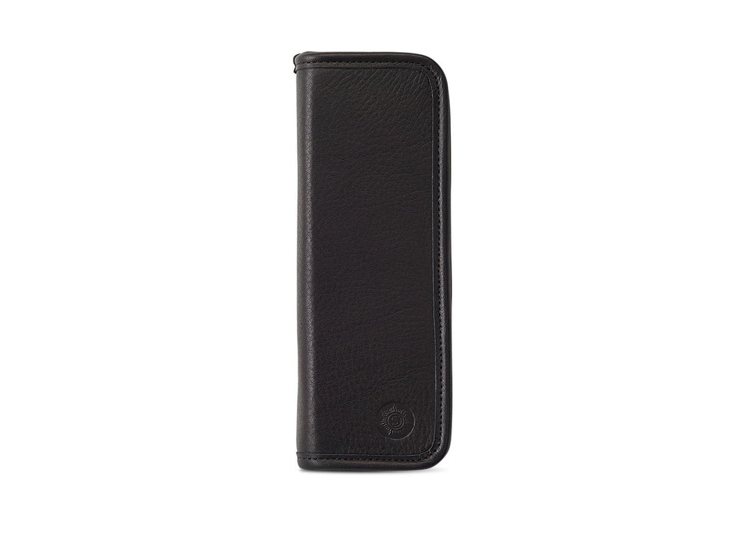 Front exterior view of the Sonnenleder Böll Leather Pencil Case in Black, showcasing the deep, matte-satin finish of pit-tanned South German cowhide and signature embossed logo.