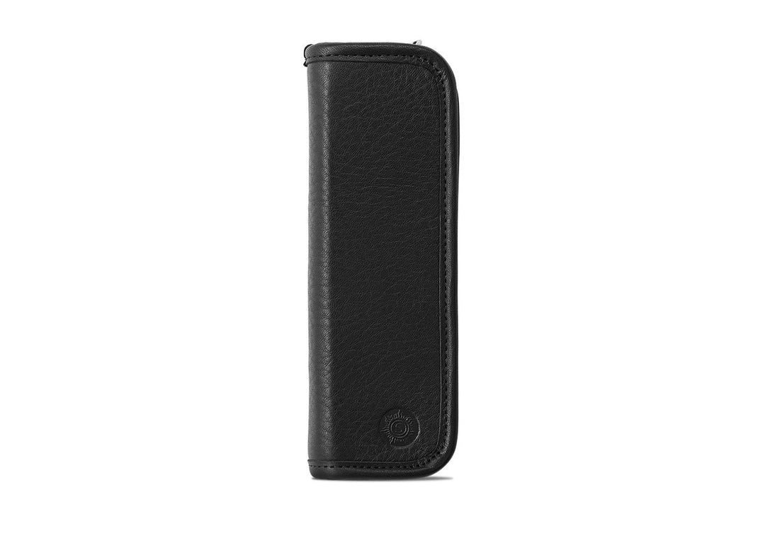 Front view of the Sonnenleder Grass Pen Case in Black matte-satin leather with the distinctive circular sun logo embossed at the base.