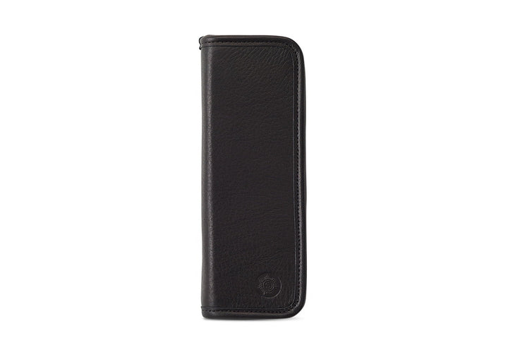 Front exterior view of the Sonnenleder Kluge Leather Pencil Case in Black, showcasing the deep matte-satin vegetable-tanned cowhide and signature embossed sun logo.