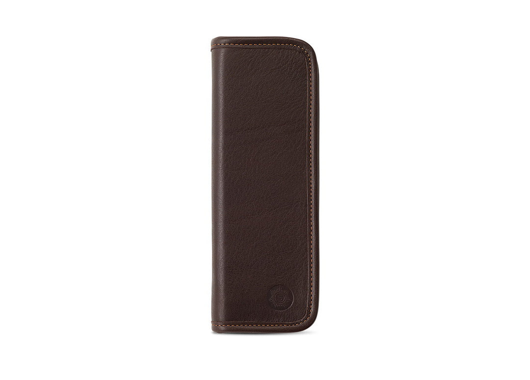 Front exterior view of the Sonnenleder Kluge Leather Pencil Case in Mocha Brown, showcasing the rich chocolate tone of pit-tanned cowhide and signature embossed sun logo.