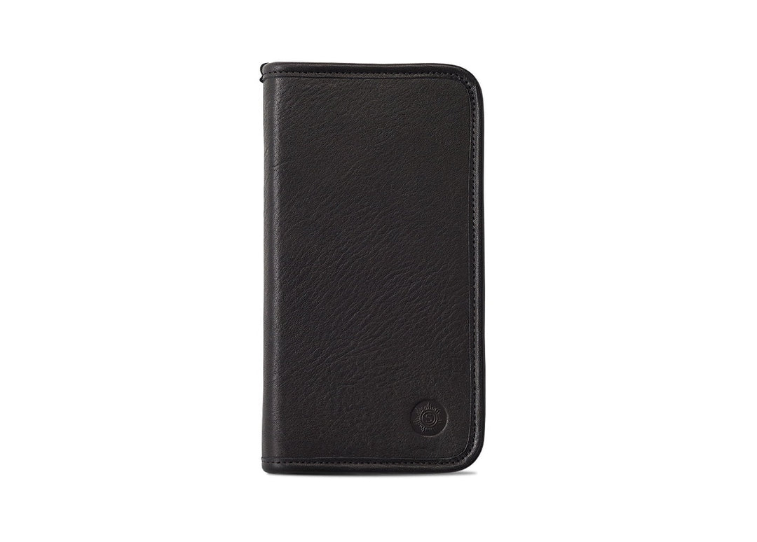 Front exterior view of the Sonnenleder Novalis Leather Pencil Case in Black, showcasing the deep matte-satin vegetable-tanned cowhide and signature embossed sun logo.