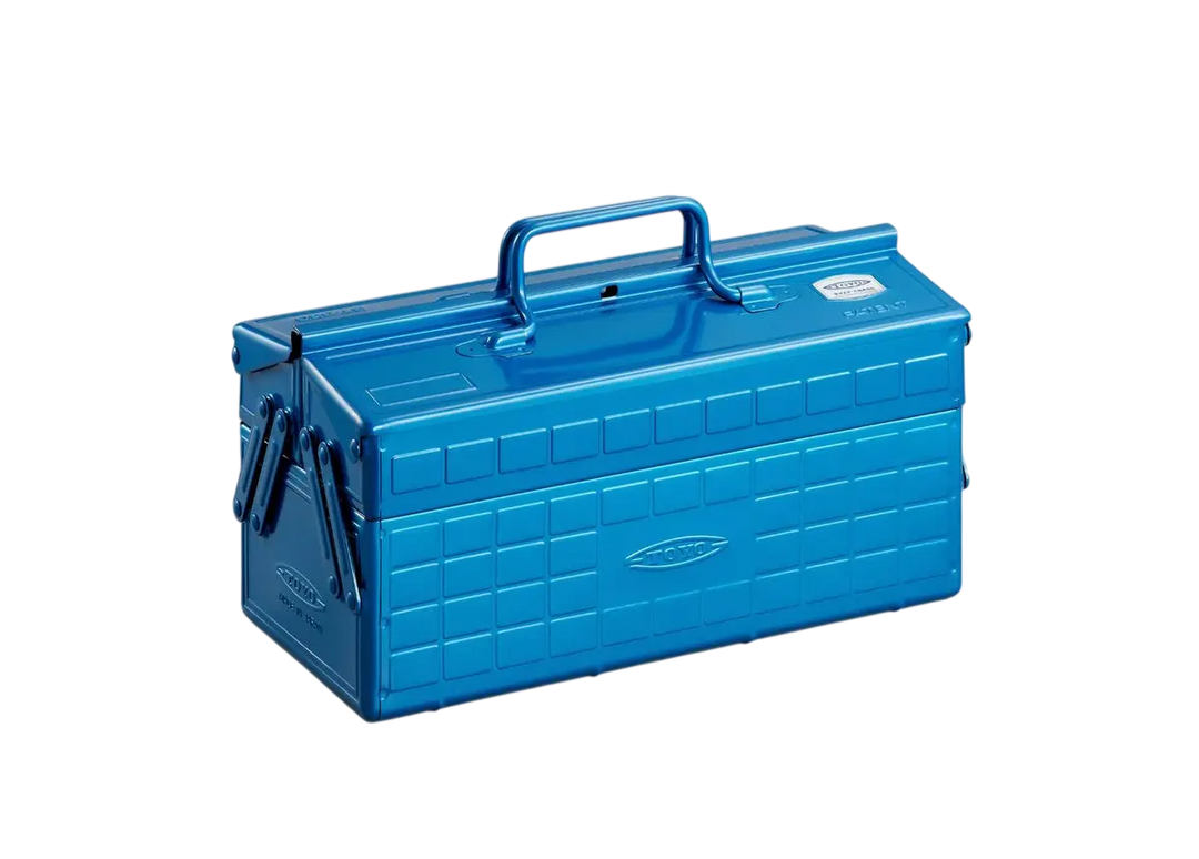 Blue TOYO ST-350 Cantilever Steel Toolbox shown closed, highlighting the seamless heavy-duty metal chassis and dual carry handles.