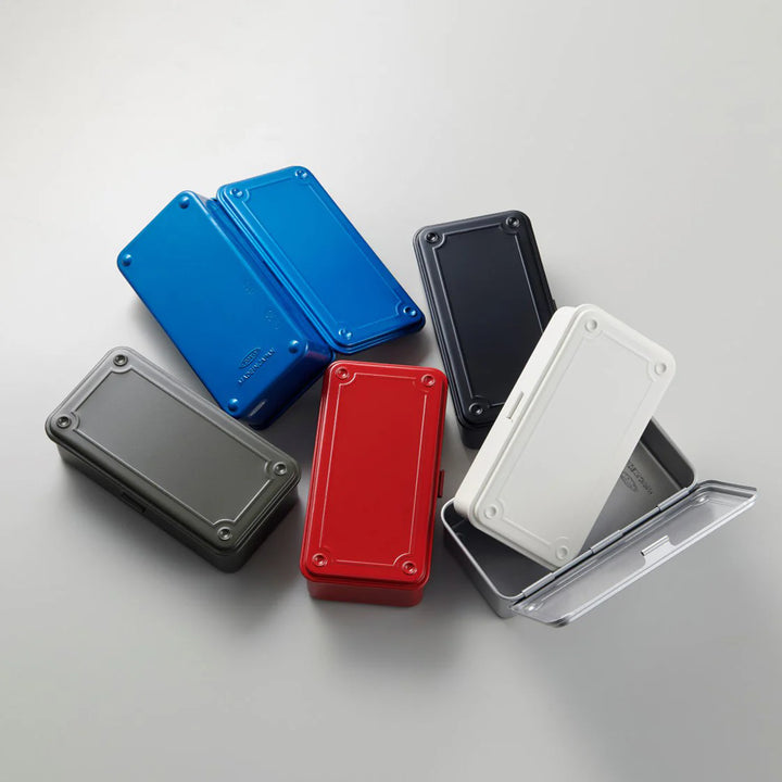 Collection of TOYO T-190 Steel Toolboxes in blue, black, white, red, and silver, showing their stackable Japanese design.