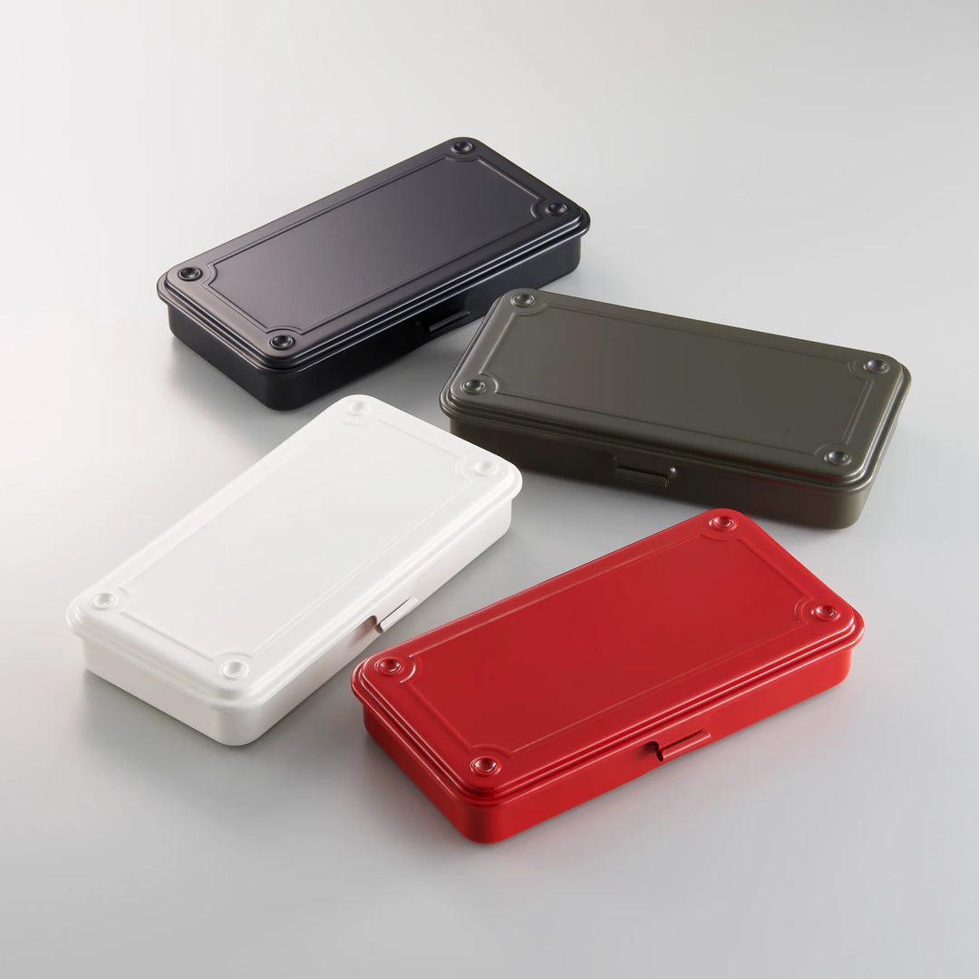 Collection of slim TOYO T-192 Steel Toolboxes in Black, Moss Green, White, and Red, showcasing the seamless Japanese design.