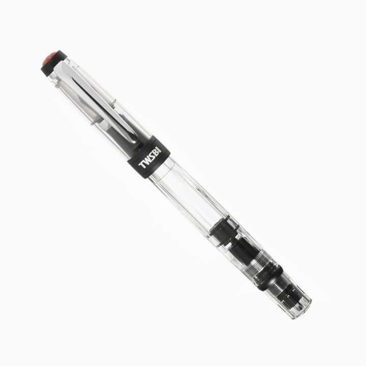 Angled view of the fully capped TWSBI Diamond 580ALR Black fountain pen on a white background, showing the clear faceted demonstrator barrel, matte black anodized aluminum trim, and polished silver clip.