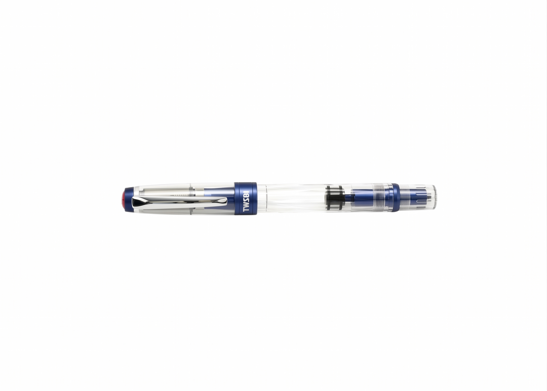 A central, perfectly horizontal product photograph of the capped TWSBI Diamond 580ALR Navy Blue fountain pen, showcasing the clean, professional silhouette and matte navy blue trim on a pristine, seamless white background.